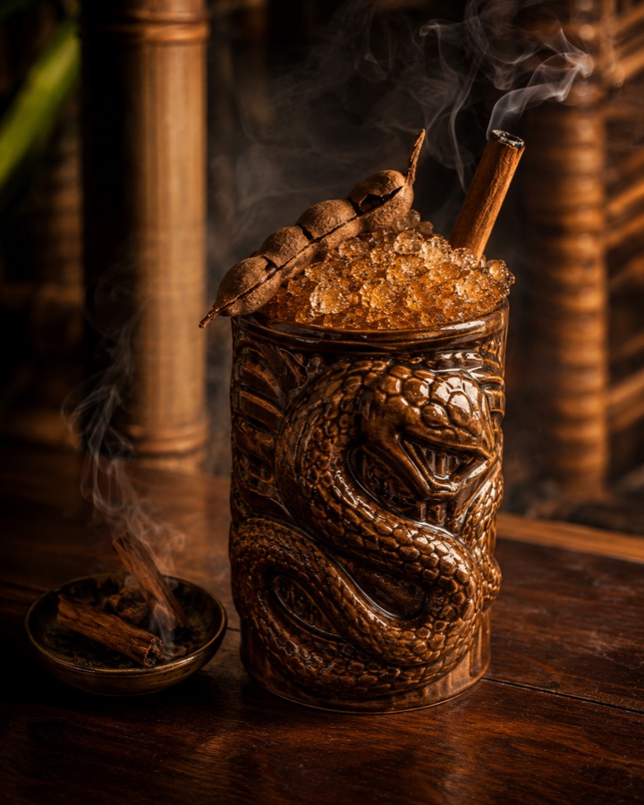 Mekong Naga in a serpent-carved copper mug with cinnamon smoke